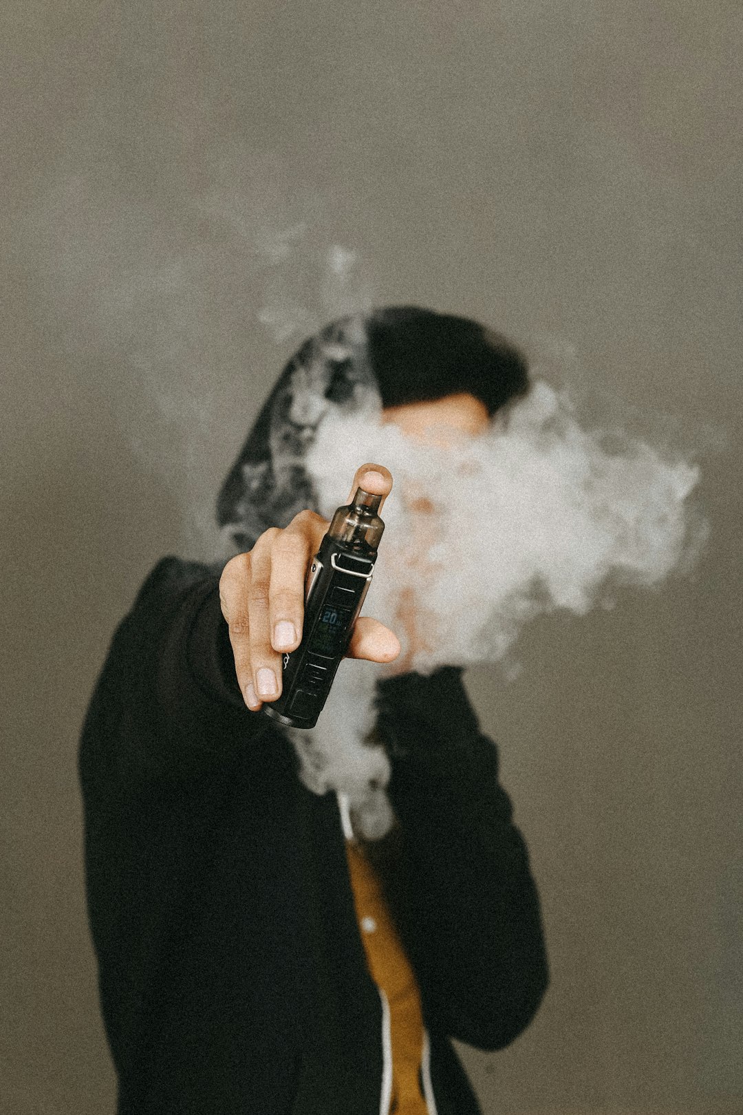 Moody vape portrait with cinematic tones
